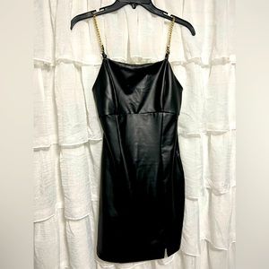 black faux leather mini dress in size small